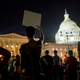 Supporters of House Democrats taking part in a sit-in on the House floor shout encouragement from outside the U.S. Capitol in Washington, D.C., on June 22, 2016.
Pete Marovich/Getty Images